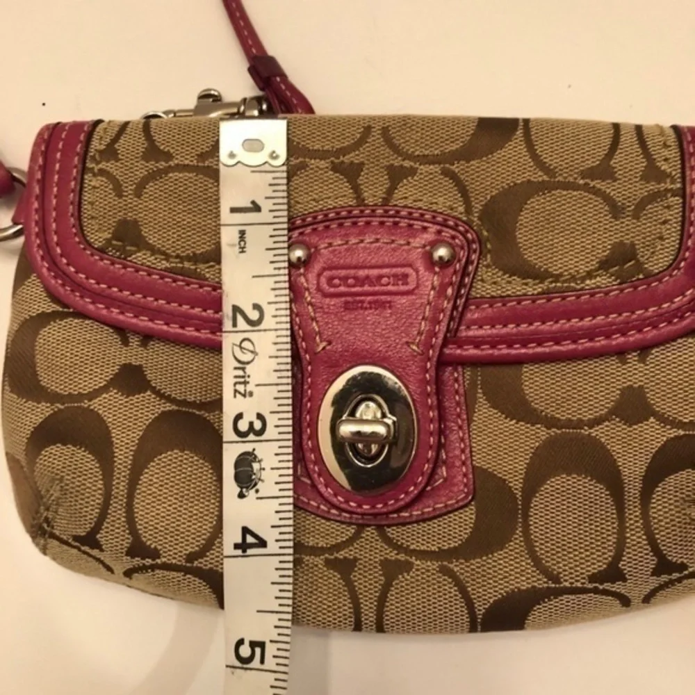 Coach signature brown dark pink leather wristlet